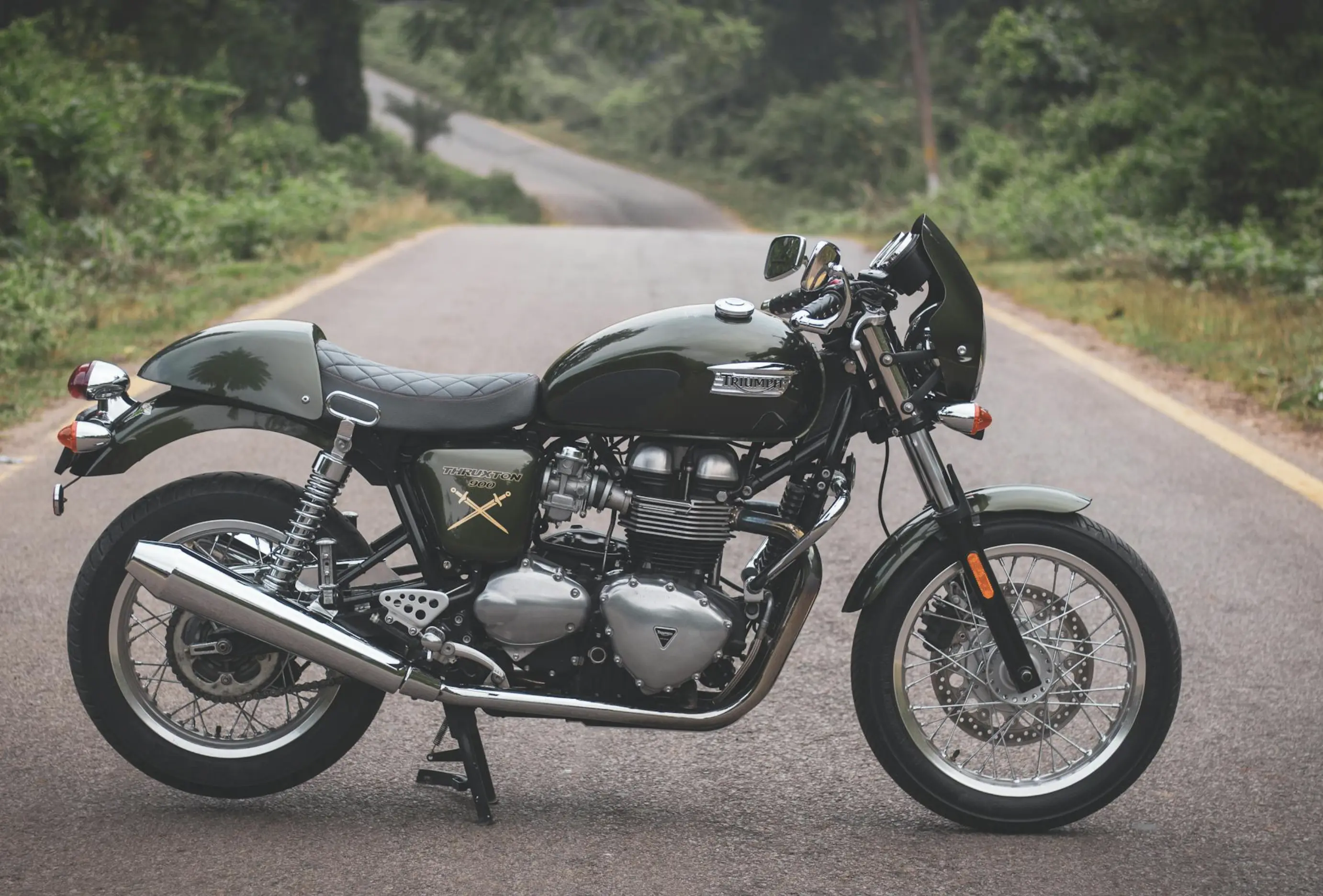 Classic motorcycle on rural road